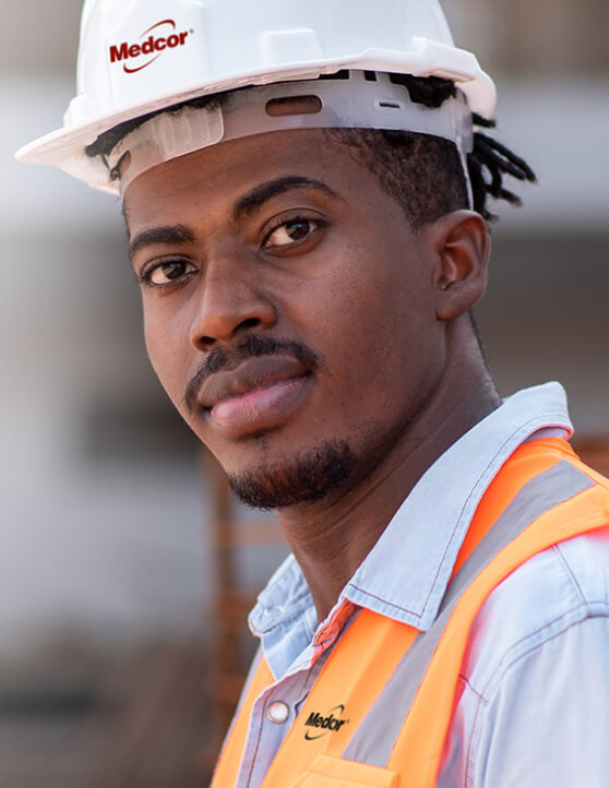 Medcor Occupational Health employee wearing safety gear onsite.