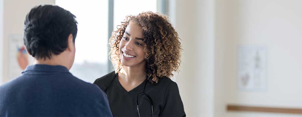 nurse-with-patient-scrubs