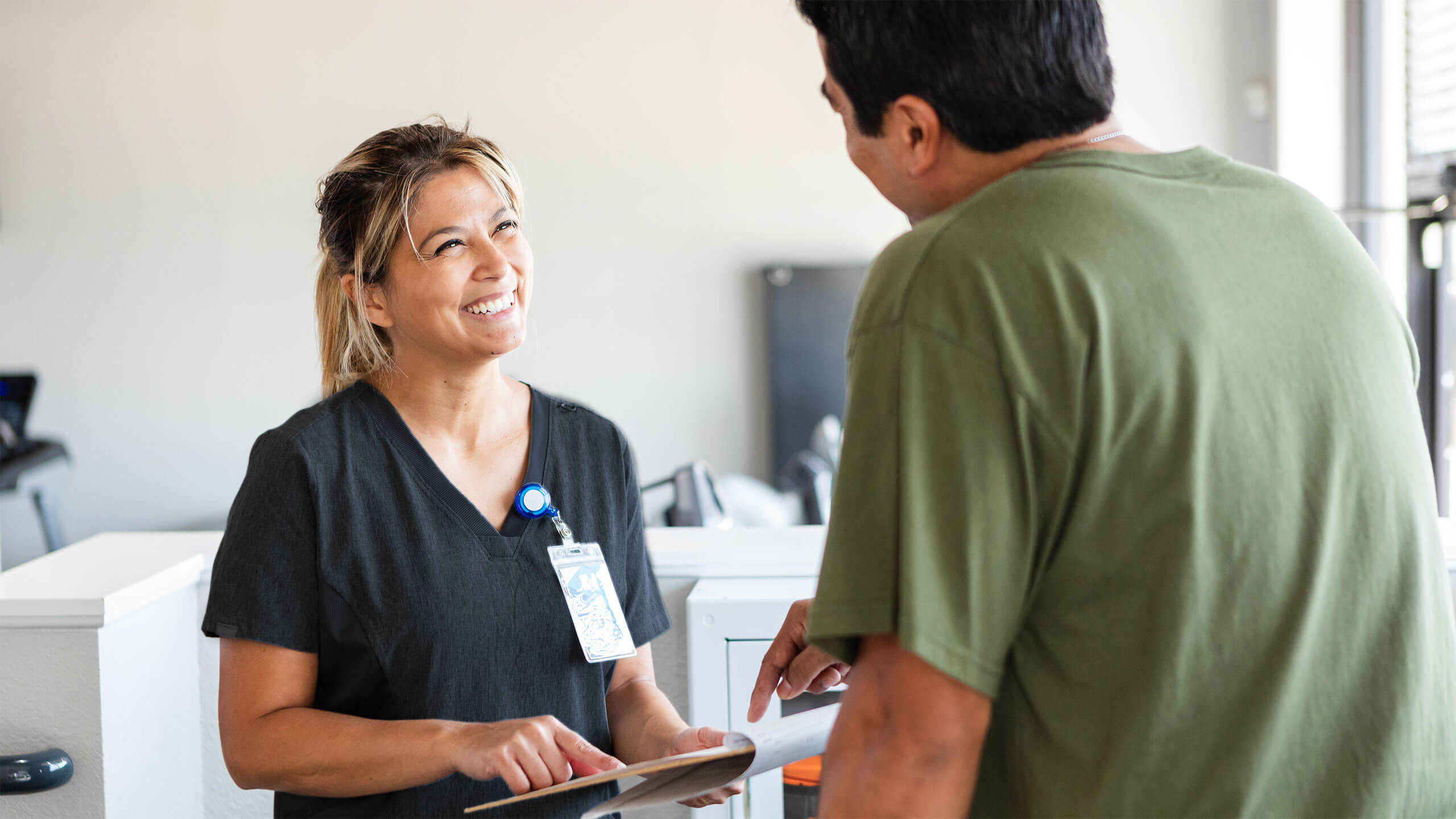 Occupational health nurse and patient