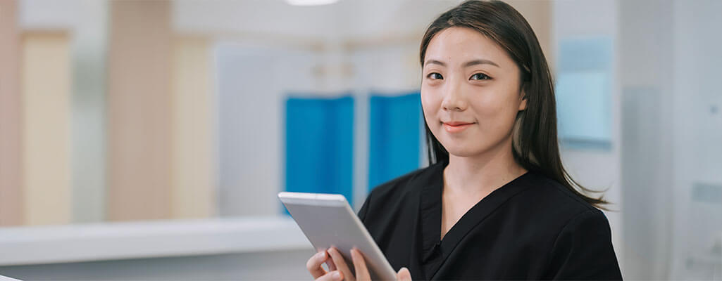 Nurse working from a tablet