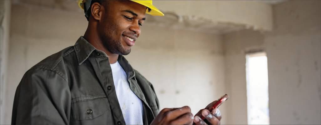 manager checking data on his phone