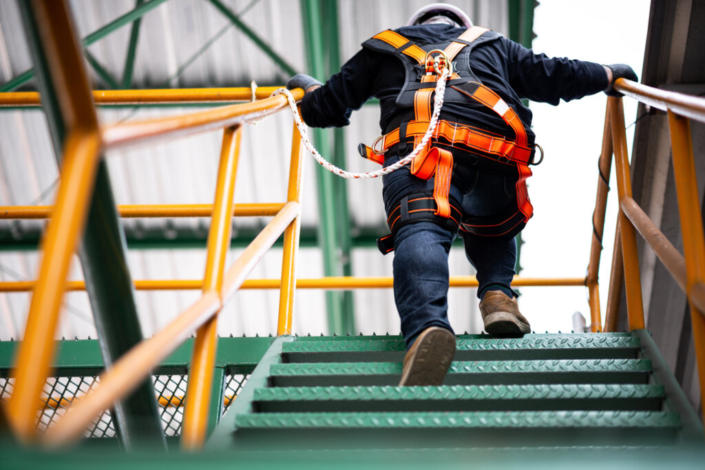 construction worker going up steps
