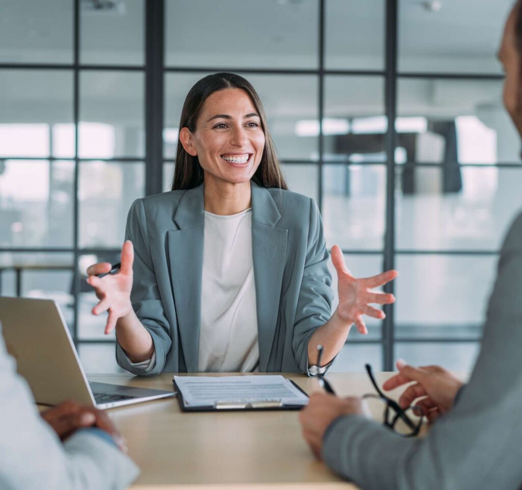 LaunchPoint occupational health consultant presenting to clients in office meeting