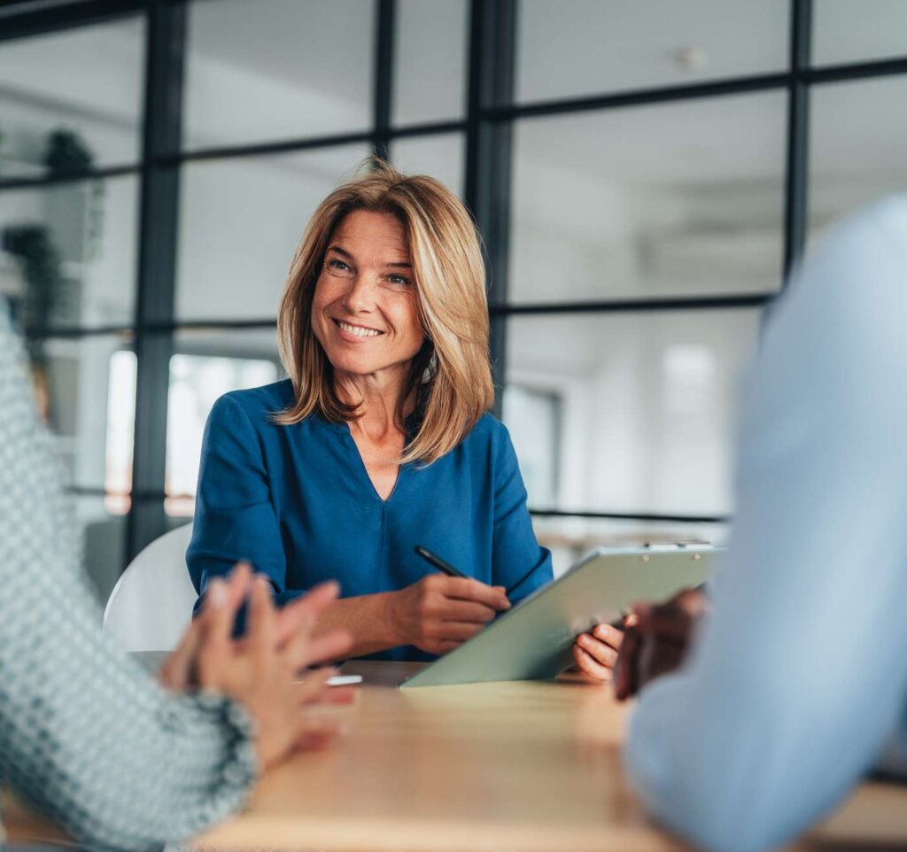 LaunchPoint onsite health manager reviewing notes with employees