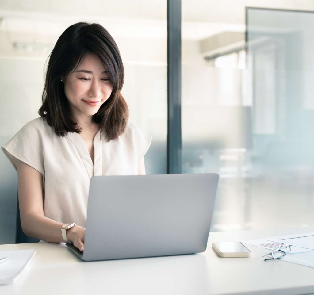 LaunchPoint occupational health professional working at office desk